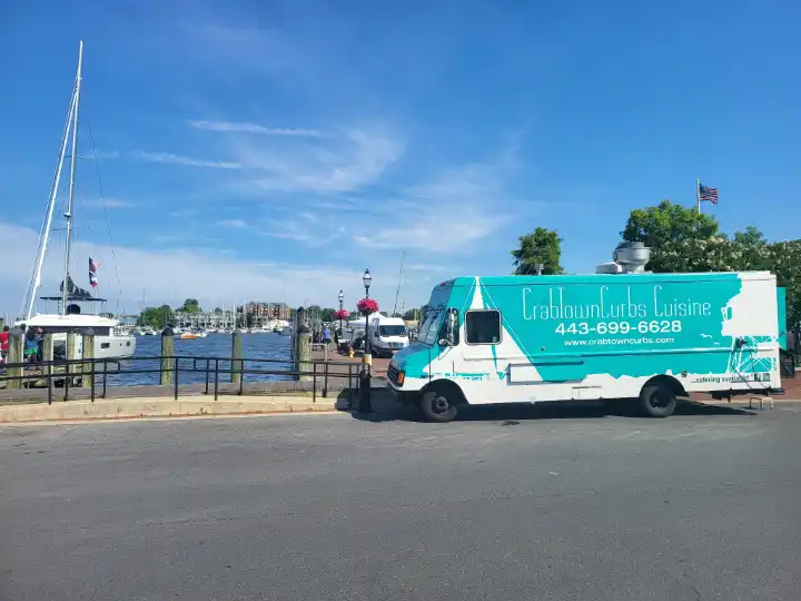 CrabTown Curbs food truck parked near a waterfront area