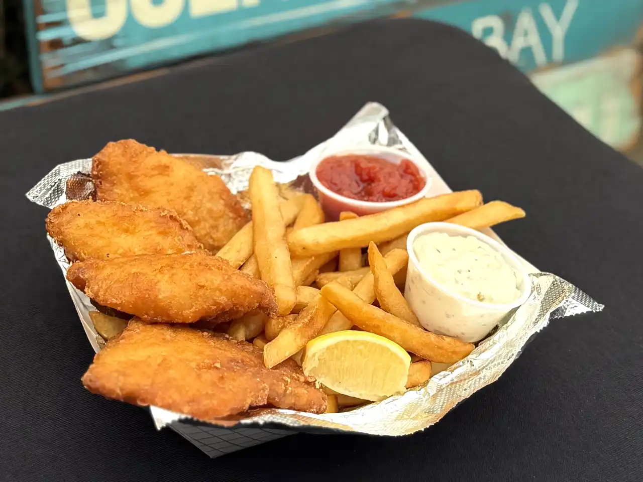 Beer-battered rockfish and fries in a basket